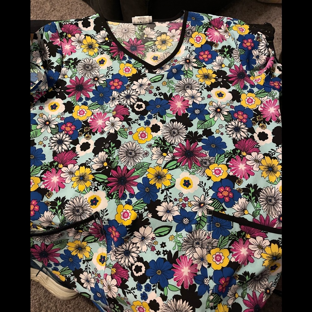 Colorful scrub top in medium.